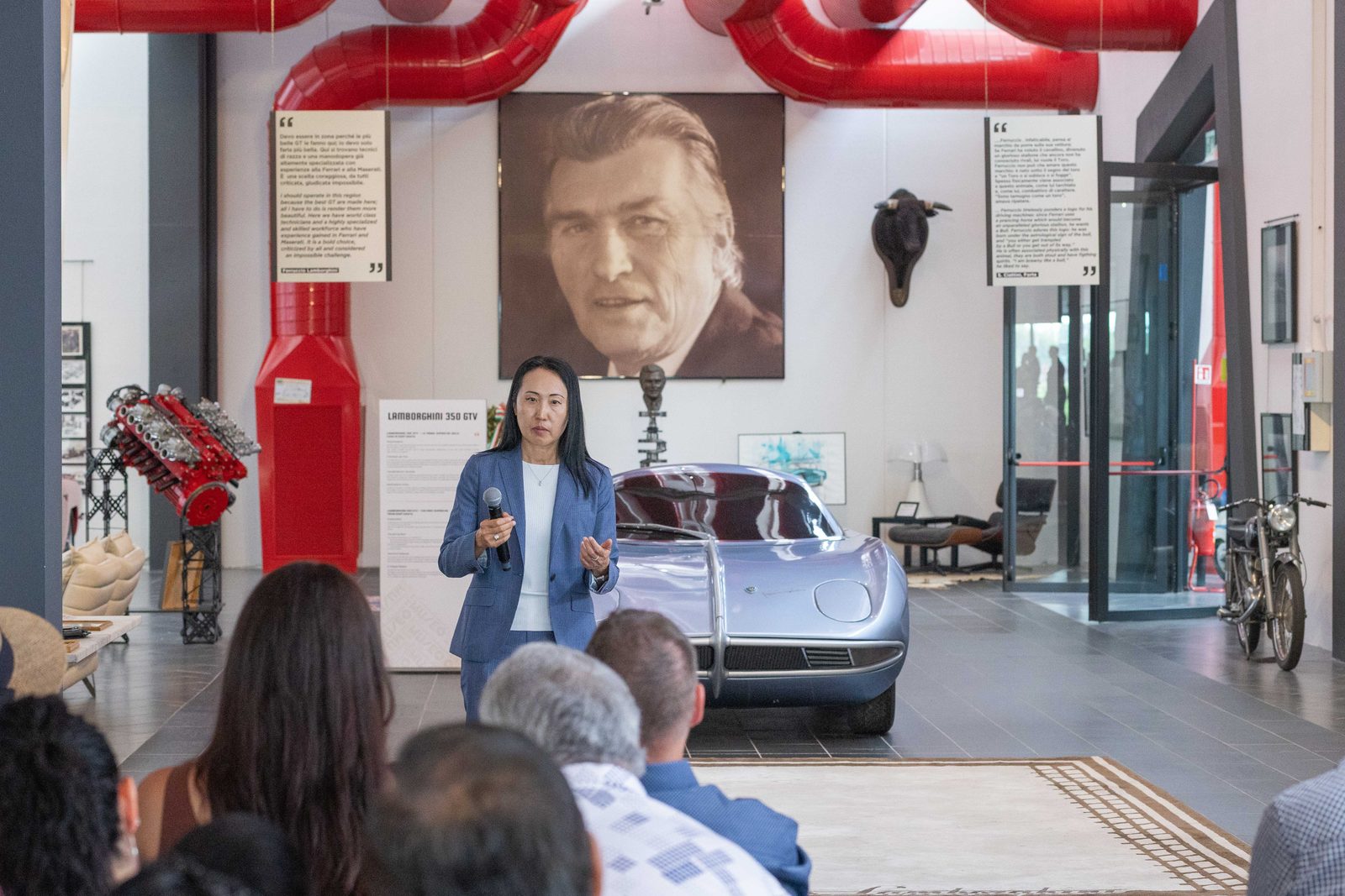 Eri Ishikawa delivering a talk at a Lamborghini event